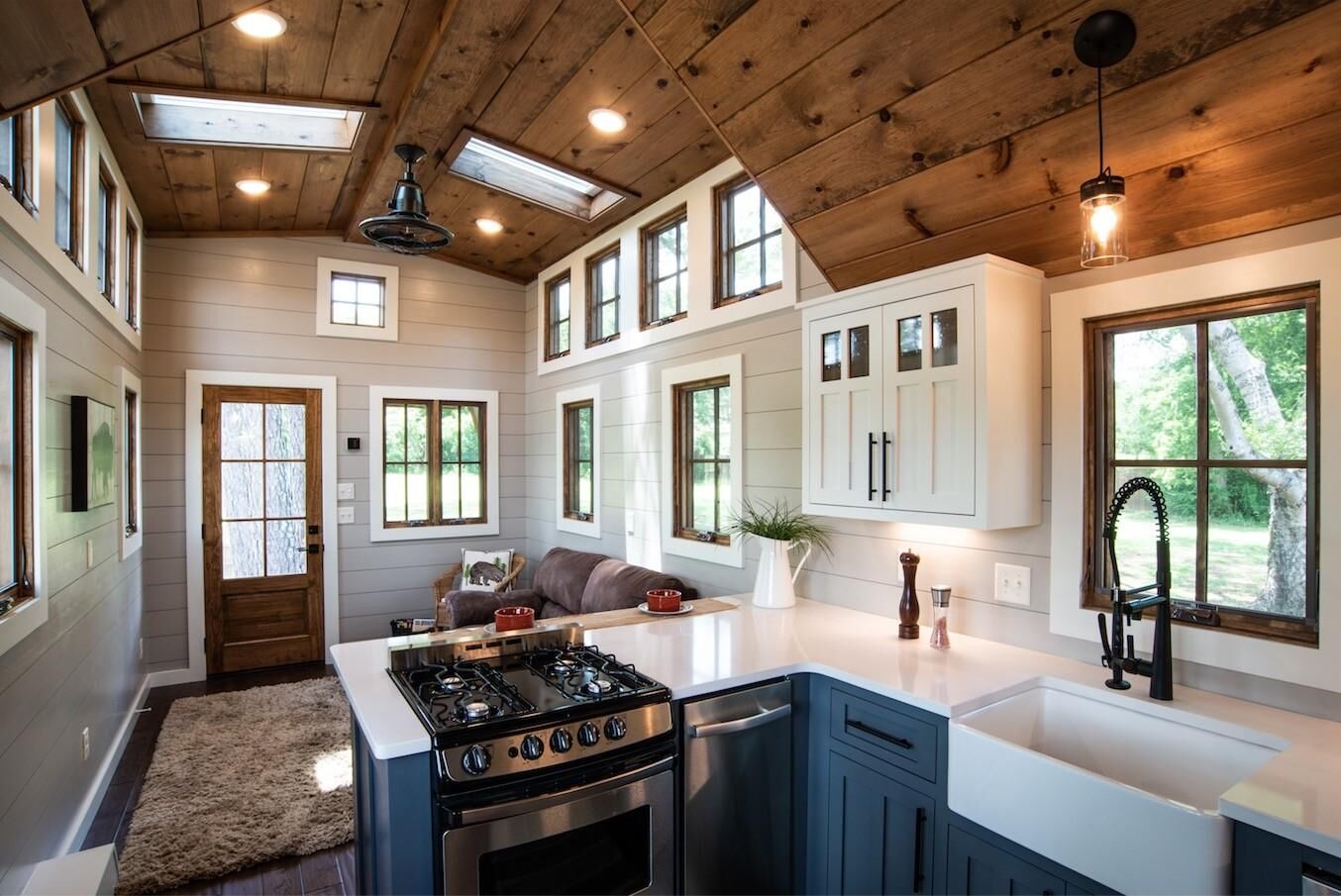Renovated kitchen with shaker cabinetry, timber ceiling and skylights